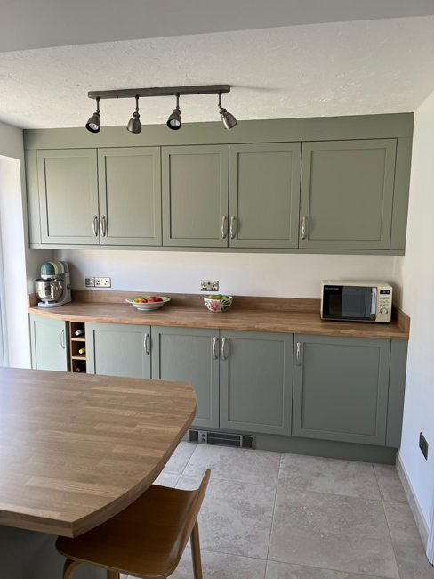 French grey shaker kitchen with an oak breakfast bar