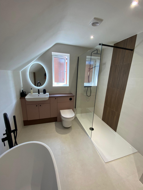 Matt rose vanity unit with an oval LED mirror